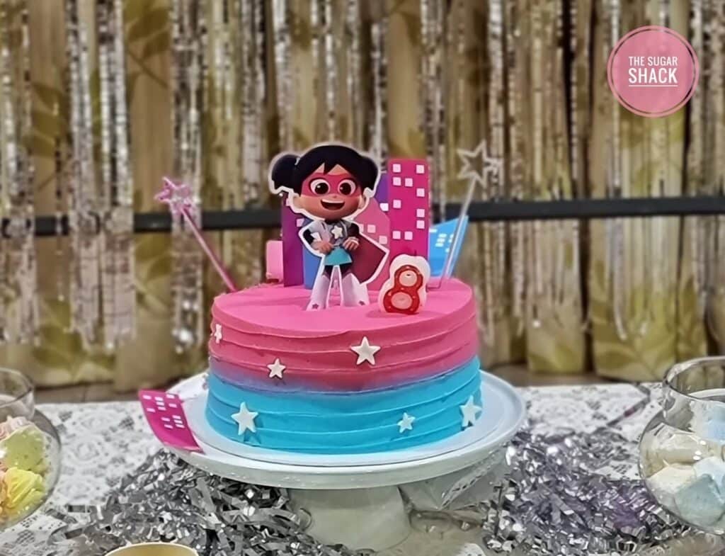 Yummy Ombre Pink and Blue layered birthday cake with Starbeam cake topper
