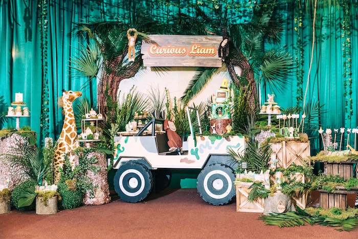 Backyard Safari Animals birthday party decor with trailing faux greenery vines