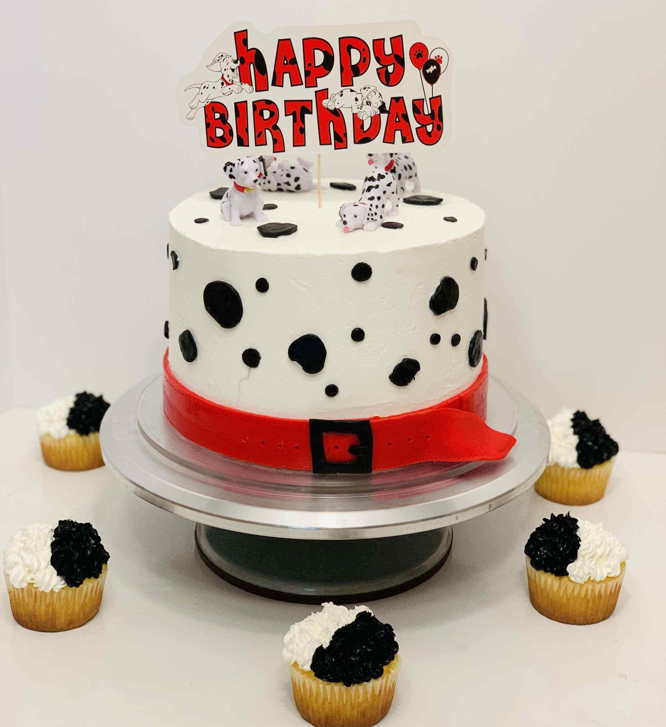 101 Dalmatians Birthday Cake with white base fondant and red dog leash