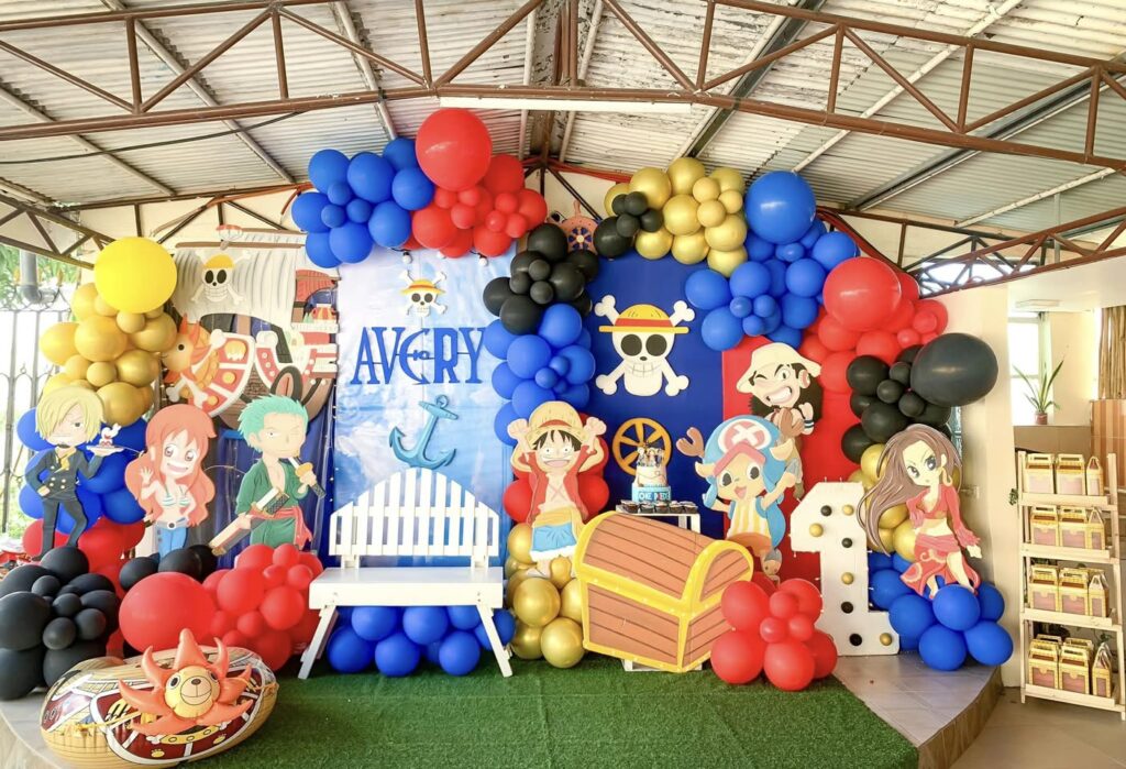 One Piece Inspired Party Decor with Colorful Balloon Garland and DIY Cardboard Luffy Zoro Sanji and Chopper cutouts