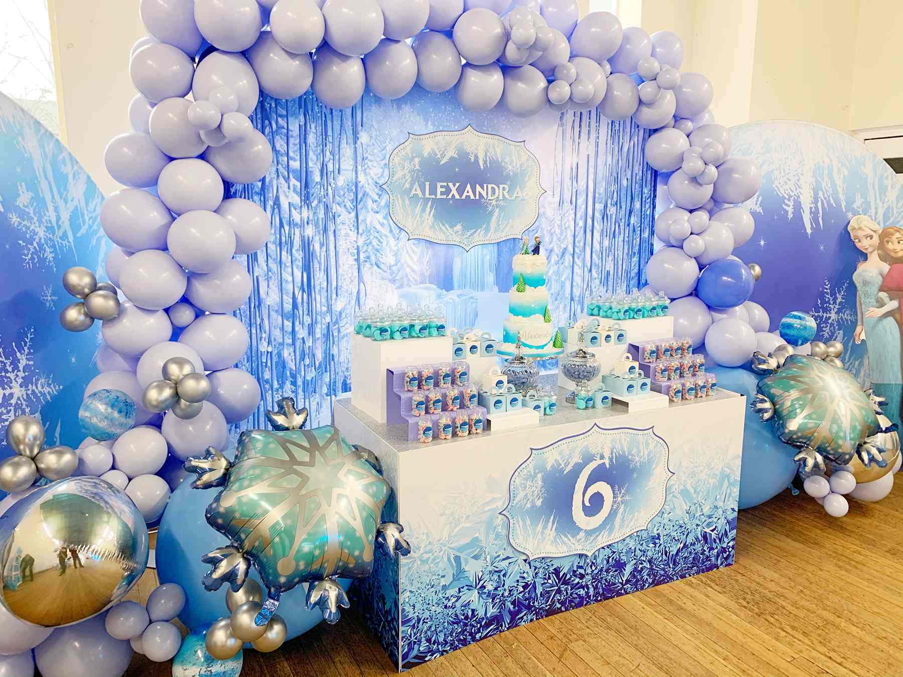 Frozen Birthday Party Decor with Snow Blue colored balloon arch garland