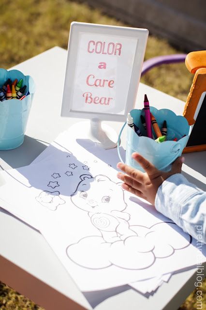 Printable Care Bears invitation with pastel rainbow background, smiling bears, shooting stars, hearts, and balloons