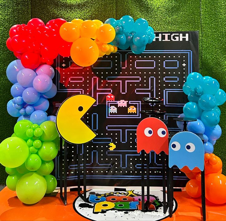 Pacman Canva invitation template decorated with pixel hearts, arcade maze walls, power pellets, ghosts, and gaming-inspired birthday graphics