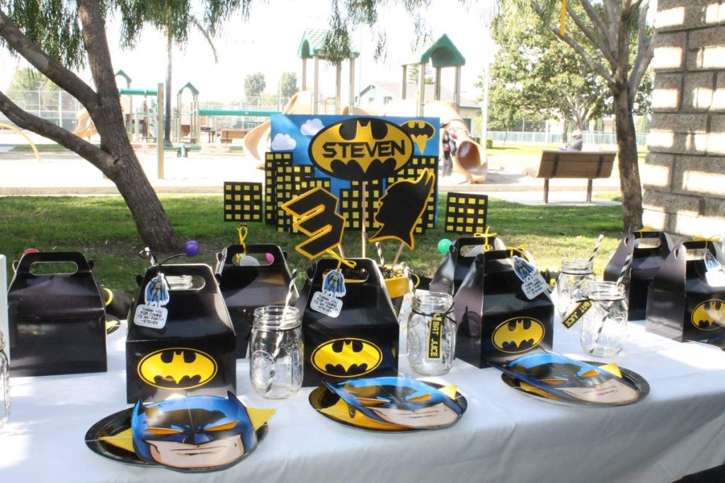 Backyard Batman Birthday Party Setup with Gotham City Skyline backdrop