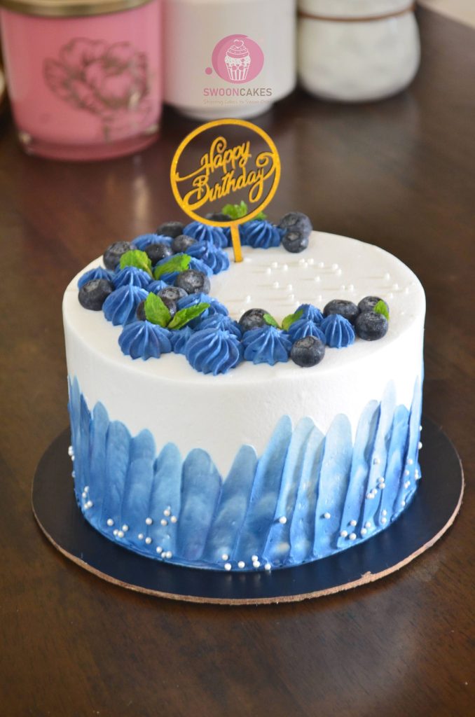 Berry First Birthday Cake with Blueberry topping