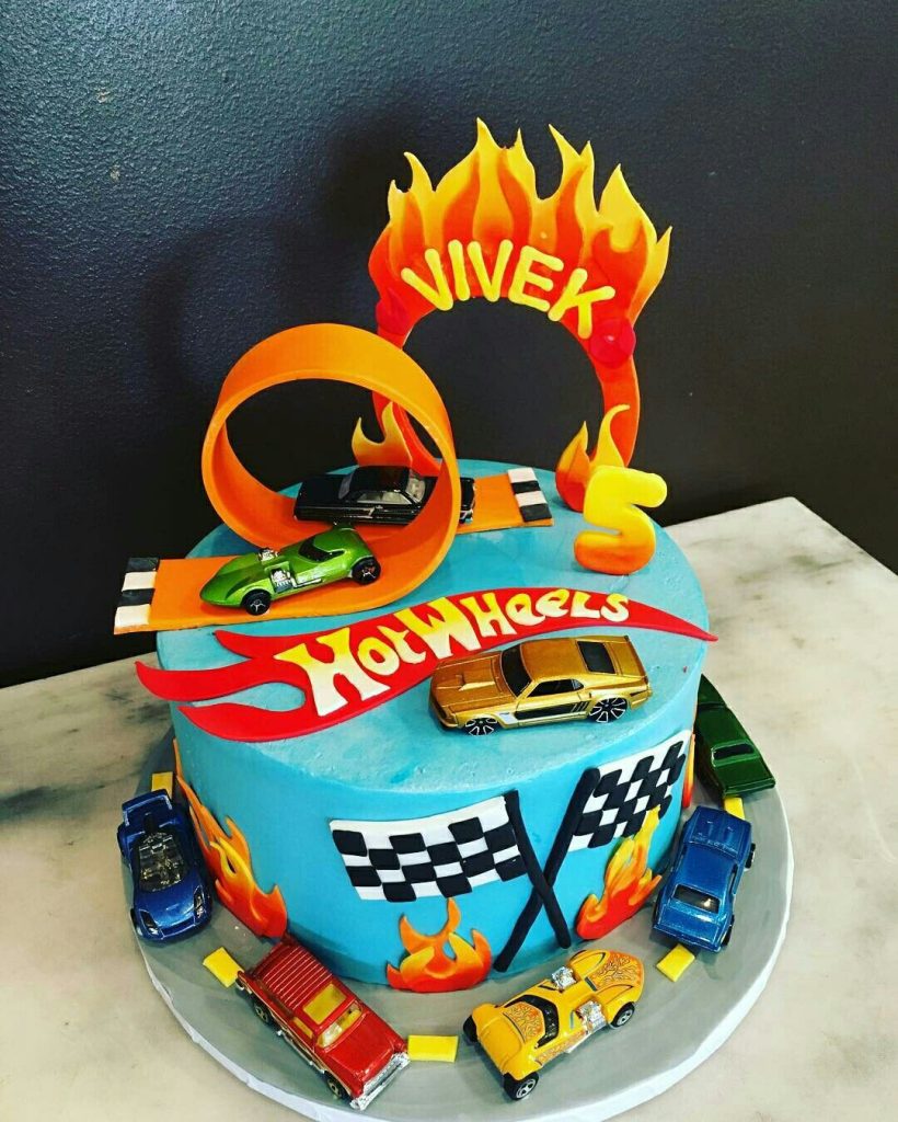 Simple Hot Wheels Birthday Cake with DIY Fondant Hot Wheels Loop, Logo and Toy Cars on top