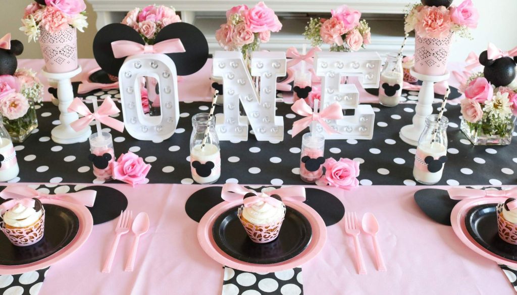 Minnie Mouse First Birthday Party decor with black and white polka dot tablecloth